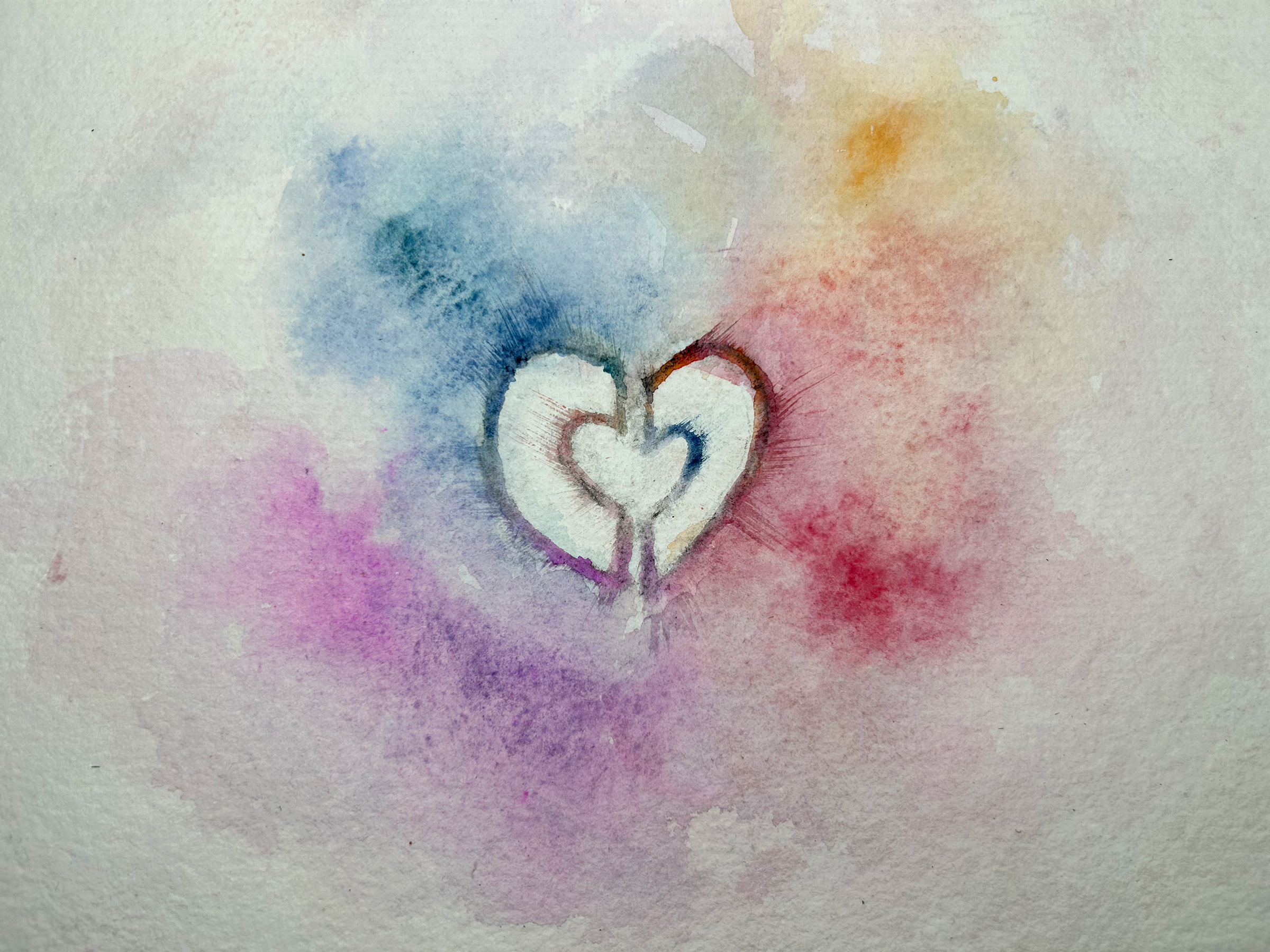 Aligning Hearts — two hearts forming a single heart on a watercolor wash