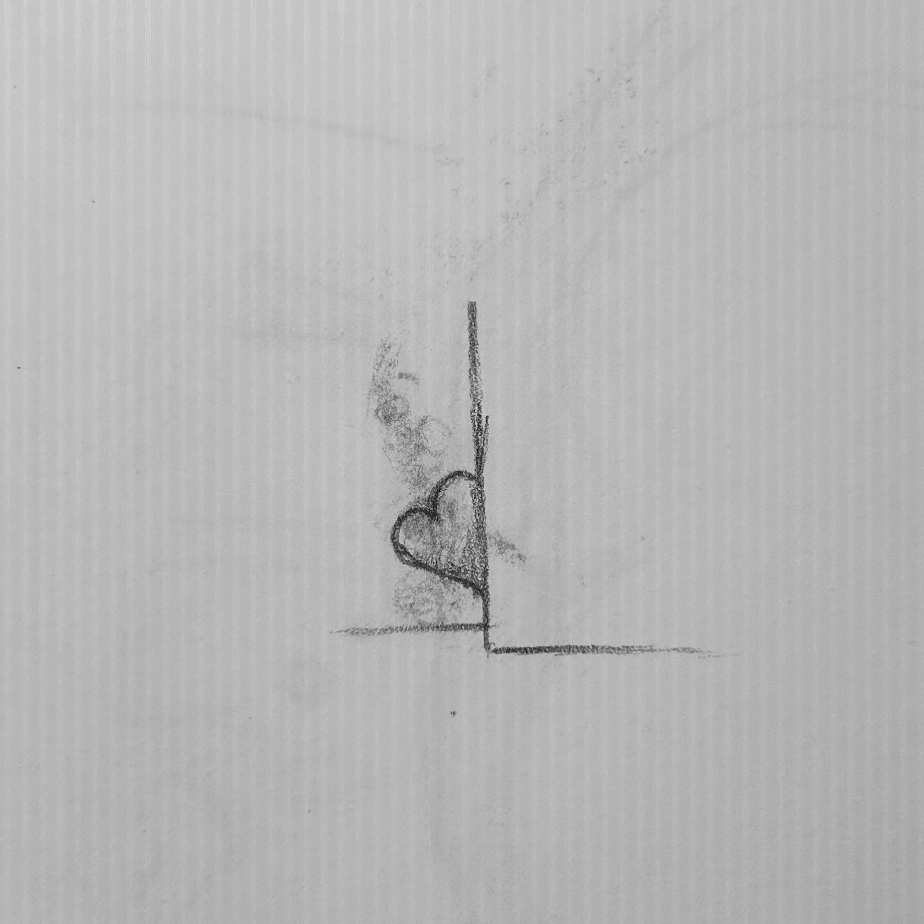 Heart peeking around a corner